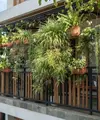 Inspirasi Pagar Balkon untuk Tanaman Gantung (AI Generated)