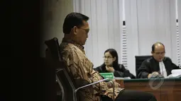 Terdakwa kasus dugaan korupsi simulator surat izin mengemudi yang juga mantan Wakil Kepala Korlantas Brigjen Pol Didik Purnomo menjalani sidang pembacaan tuntutan oleh JPU KPK di Pengadilan Tipikor, Jakarta, Senin (16/3/2015). (Liputan6.com/Helmi Afandi)