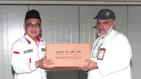 Kepala PPIH Arab Saudi Daerah Kerja Makkah Khalilurahman saat meninjau pengemasan daging dam haji di Masta RPH Alokishia, Makkah, Kamis 14 Juli 2023. (FOTO: MCH PPIH ARAB SAUDI 2023)