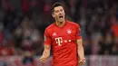 Torehan 11 gol Lewandowski juga menyamai rekor Cristiano Ronaldo sebagai pencetak gol terbanyak dalam semusim Liga Champions. (AFP/Christof Stache)