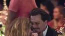 Kemesraan Johnny Depp dan Amber Heard saat menghadiri The Art of Elysium 2016 HEAVEN Gala di California, 9 Januari 2016. Johnny Depp dan Amber Heard menikah pada Februari 2015. Sayangnya pernikahan mereka hanya bertahan selama 15 bulan. (AFP PHOTO)
