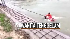 Beberapa pemadam kebakaran di China coba menyelamatkan wanita yang tenggelam dan terseret arus sungai yang deras. Korban diketahui tak sengaja terjatuh.
