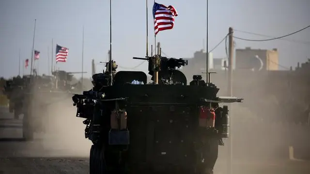 Tank milik tentara AS melintas di wilayah Iran.