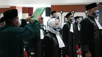 Dewan Pengacara Nasional (DPN) Indonesia secara resmi melantik dan mengambil sumpah advokat baru di Gedung Pengadilan Tinggi Jakarta, Kamis (18/3/2021).