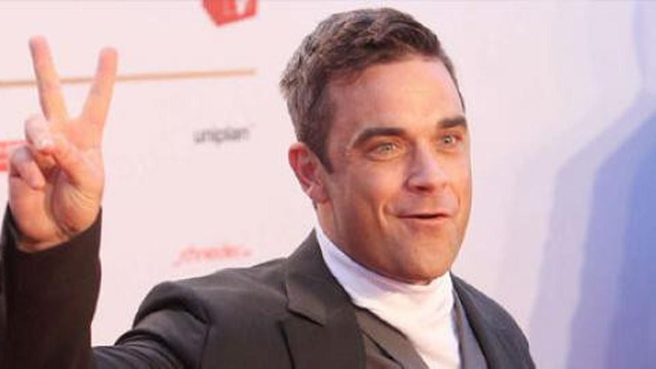 Robbie Williams dalam euforia kelahiran sang putri