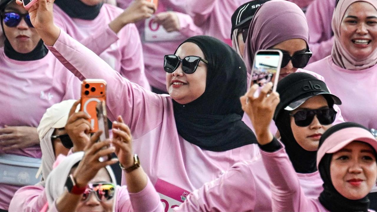 FOTO: Keseruan Lari Santai Khusus Perempuan di Banda Aceh