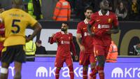 Pemain Liverpool, Mohamed Salah, mencetak gol kedua The Reds dalam kemenangan 2-1 atas Wolverhampton Wanderers di Molineux Stadium, Sabtu (28/9/2024) malam WIB. (AP Photo/Rui Vieira)