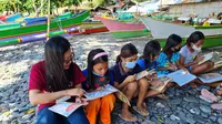 Kegiatan yang digelar di kelurahan Posokan, Lembeh Utara, Kota Bitung ini dengan memberikan 415 buku pembelajaran dari hasil donasi.