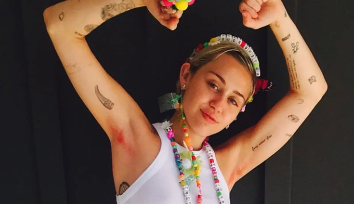 Miley Cyrus merasa malu ketika diminta untuk foto bareng. Hal itu dikarenakan ia merasa canggung. (instagram/mileycyrus)