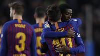 Lionel Messi dan Ousmane Dembele sama-sama menyumbang gol saat mengalahkan Celta Vigo dalam laga lanjutan La Liga, di Camp Nou, Sabtu (22/12/2018) malam waktu setempat. (AP Photo/Manu Fernandez)