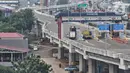 Kendaraan saat melintasi Gerbang Tol (GT) Pisangan, Jatinegara, Jakarta Timur, Senin (15/3/2021). PT CMNP mulai mengoperasikan GT Pisangan yang menghubungkan sisi barat ruas Tol Becakayu Seksi 1A dengan ruas Tol Ir Wiyoto Wiyono. (merdeka.com/Iqbal S. Nugroho)