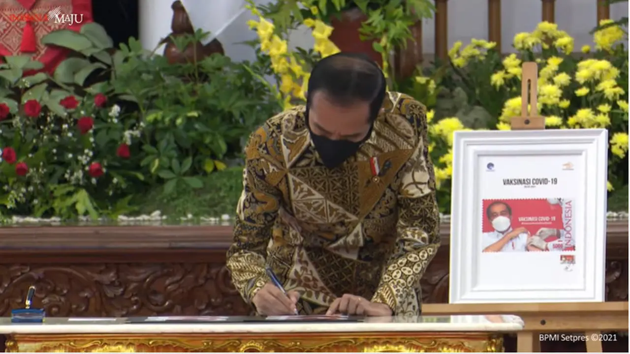 Presiden Joko Widodo Menandatangani Prangko Seri Khusus Covid-19