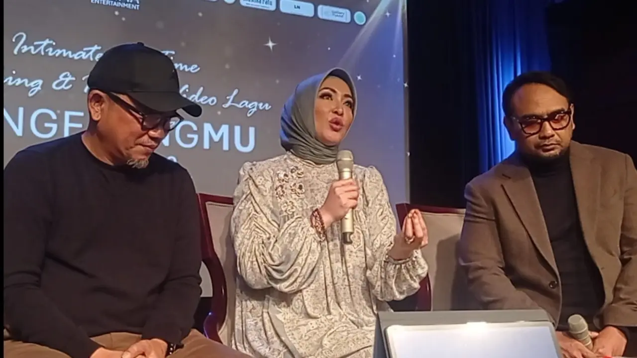 Angelina Sondakh mengenang mantan suaminya, Adjie Massaid, lewat sebuah karya musik.
