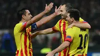 Xavi Hernandez (kiri) bersama Iniesta dan Lionel Messi