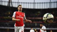 TOLAK - Gelandang Arsenal, Aaron Ramsey menolak untuk membahas mengenai ketertarikan Barcelona terhadap dirinya. (Reuters/Dylan Martinez)