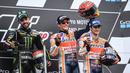 Pebalap Repsol Honda, Marc Marquez, bersama Jonas Folger dan Dani Pedrosa meraih podium pada MotoGP Jerman di Sirkuit Sachsenring, Saxony, Minggu (2/7/2017). Rider asal Spanyol itu juara dengan catatan waktu 40 menit 59,525 detik. (EPA/Filip Singer)