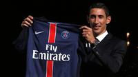 Pemain asal Argentina, Angel Di Maria resmi bergabung dengan Paris St Germain (PSG), Kamis (7/8/2015) waktu setempat. Pemain sayap Timnas Argentina itu telah menandatangani kontrak empat tahun dengan juara Ligue 1 tersebut. (REUTERS/Christian Hartmann)