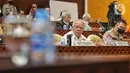 Menteri PUPR Basuki Hadimuljono dan Kakorlantas Polri Irjen Pol Firman Shantyabudi mengikuti rapat kerja dengan Komisi V DPR di Kompleks Parlemen, Senayan, Jakarta, Selasa (13/12/2022). Rapat tesebut membahas kesiapan infrastruktur dan transportasi terkait Libur Natal 2022 dan Tahun Baru 2023. (Liputan6.com/Angga Yuniar)