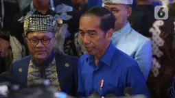 Kedatangan Presiden Joko Widodo disambut langsung Ketua Umum PAN, Zulkifli Hasan. (Liputan6.com/Angga Yuniar)