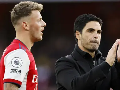 Mikel Arteta - Pria asal Spanyol ini telah malang melintang sebagai pemain di klub besar Eropa termasuk PSG, Arsenal hingga Barcelona. Sejak pensiun tahun 2016, Arteta telah memutuskan berkarier sebagai juru taktik. Kini ia menukangi mantan klubnya Arsenal sejak Desember 2019. (AFP/Tolga Akmen)