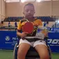 Kenzie Aqila Kadir adalah bocah penyandang disabilitas daksa yang berhasil meraih medali emas di Pekan Paralympic Pelajar Daerah (Peparpeda) III Jawa Barat (Jabar) 2023. Foto: Dok. Pribadi.