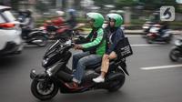 Ilustrasi driver ojol antar customer (Liputan6.com)