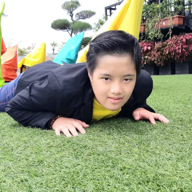 Wahyu Nizam Arden Abhista penyandang Down syndrome asal Malang. Foto: Dok. Pribadi.