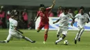 Pemain Korea Utara, Kim Kum Chol, saat melawan Indonesia pada laga PSSI Anniversary Cup 2018 di Stadion Pakansari, Senin (30/4/2018). Skor berakhir imbang 0-0. (Bola.com/M Iqbal Ichsan)