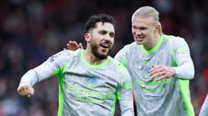 Pemain Manchester City, Rayan Cherki, bersama Erling Haaland merayakan gol ke gawang Nottingham Forest pada laga pekan ke-18 Premier League di Stadion The City Ground, Sabtu (27/12/2025). (Barrington Coombs/PA via AP)