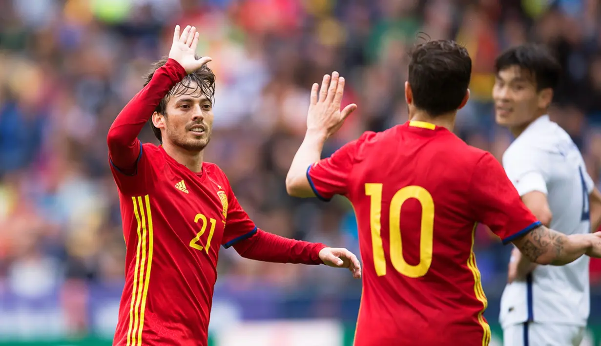Ekspresi pemain Spanyol, David Silva, setelah mencetak gol pertama ke gawang Korea Selatan pada laga persahabatan di Red Bull Arena, Wals-Siezenheim, Austria, Rabu (1/6/2016). (EPA/Andreas Schaad)