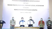 BPJS Kesehatan dan Komisi Pemberantasan Korupsi (KPK) sepakat menjalin kerjasama melalui penandatanganan Nota Kesepahaman Sinergitas Pemberantasan Tindak Pidana Korupsi Pada Program Jaminan Kesehatan Nasional, Kamis, 18 Maret 2021. (Dok BPJS Kesehatan)