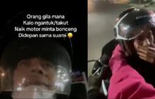 Menghadap ke suami, solusi saat istri ngantuk di motor adalah dibonceng depan.