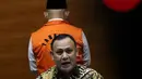Ketua KPK, Firli Bahuri saat rilis penetapan dan penahanan tersangka suap dan gratifikasi pengadaan barang dan jasa di Kab Hulu Sungai Utara (HSU) 2021-2022, Gedung KPK, Jakarta, Kamis (18/11/2021). KPK menahan Bupati HSU, Abdul Wahid sebagai tersangka. (Liputan6.com/Helmi Fithriansyah)