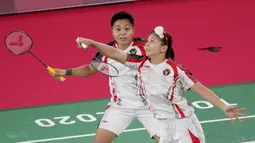 Ini menjadi kemenangan kedua Greysia/Apriyani di fase grup. Di pertandingan pertama, mereka mengalahkan ganda Malaysia, Chow Mei Kuan/Lee Meng Yean. (Foto/AP/Dita Alangkara)