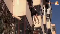 [VIDEO] Sepasang Kekasih di China Tergantung di Apartemen