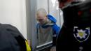 <p>Tentara Rusia, Sersan Vadim Shishimarin (21) tiba untuk menjalani sidang pengadilan di Kiev, Ukraina, Rabu (18/5/2022). Sersan Vadim Shishimarin dapat terancam hukuman seumur hidup karena membunuh warga sipil Ukraina berusia 62 tahun di desa Chupakhivka, Ukraina timur laut pada 28 Februari. (AP Photo/Efrem Lukatsky)</p>