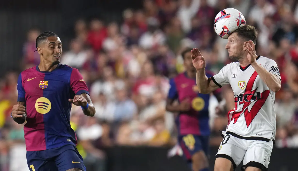 Barcelona meraih kemenangan 2-1 atas Rayo Vallecano. (AP Photo/Manu Fernandez)