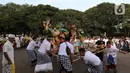 Pura Widya Dharma Cibubur menggelar parade budaya dalam rangka menyambut Hari Suci Nyepi Tahun Saka 1945 dengan mengarak ogoh-ogoh dan penampilan drama Ramayana.  (Liputan6.com/Herman Zakharia)