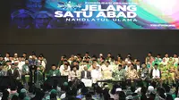Presiden Joko Widodo atau Jokowi memberi sambutan saat membuka Harlah ke-93 NU di Jakarta, Kamis (31/1). Jokowi mengatakan, RUU Pesantren agar para santri bisa bersaing antarnegara. (Liputan6.com/Angga Yuniar)