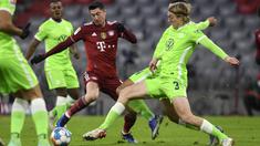 Mesin Gol Bayern Munchen itu membukukan gol terakhir Die Roten di tiga menit terakhir pada laga melawan Wolfsburg di Allianz Arena. (AP Photo/Andreas Schaad)