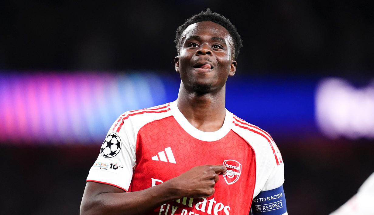 Pemain Arsenal, Bukayo Saka, melakukan selebrasi setelah mencetak gol ke gawang Atletico Madrid pada laga leg kedua semifinal Liga Champions di Stadion Emirates, Rabu (6/5/2026). (John Walton/PA via AP)