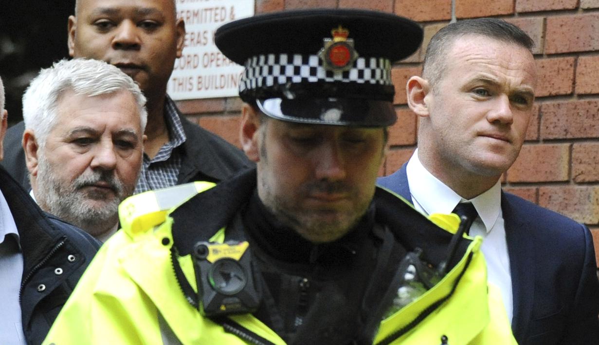 Pemain Everton, Wayne Rooney saat menjalani sidang di pengadilan Stockport Magistrates Stockport, Inggris, (18/9/2017). Kehadiran Rooney di pengadilan karena kedapatan mengemudi saat mabuk. (AP/Rui Vieira)