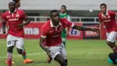 Striker Persija Jakarta, Greg Nwokolo, merayakan gol yang dicetaknya ke gawang PS TNI pada laga Torabika Soccer Championship 2016 di Stadion Pakansari, Bogor, Jumat (15/10/2016). Persija menang 2-1 atas PS TNI. (Bola.com/Vitalis Yogi Trisna)