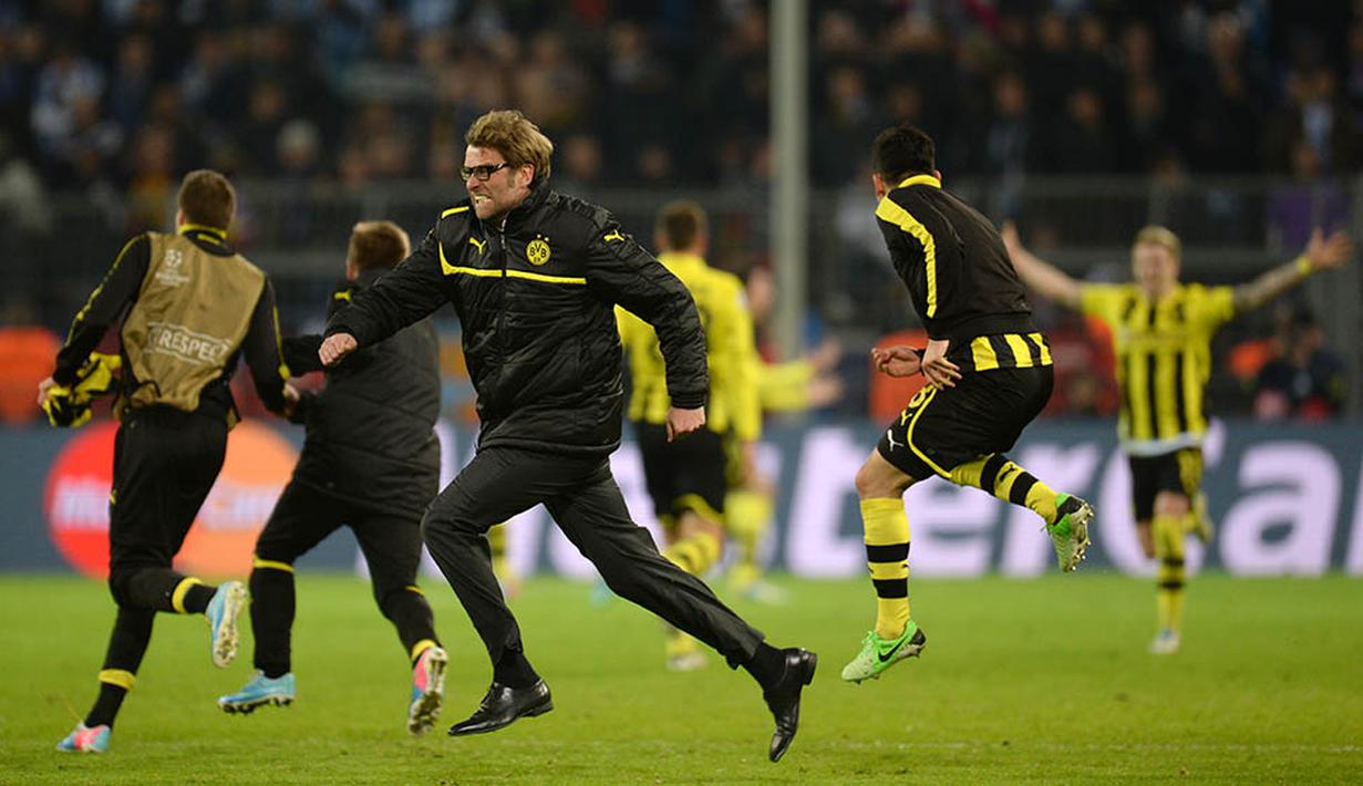Dengan materi pemain dan budget transfer secukupnya, Juergen Klopp sukses membawa Dortmund menghentikan dominasi Bayern Munchen. Pelatih 48 tahun itu pernah membawa Dortmund dua kali juara Bundesliga. (AFP/Patrik Stollarz)