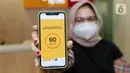 Model menunjukkan limit yang disetujui hanya dalam 60 detik pada peluncuran Kartu Kredit Digital digibank di perangkat handphone di Jakarta (16/09/2021). digibank by DBS menghadirkan Kartu Kredit Digital digibank sebagai kartu kredit digital pertama di Indonesia. (Liputan6.com/Fery Pradolo)