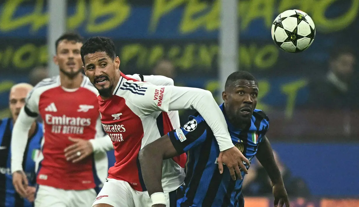Arsenal dibuat kewalahan menembus barisan belakang Inter Milan. (Gabriel BOUYS/AFP)