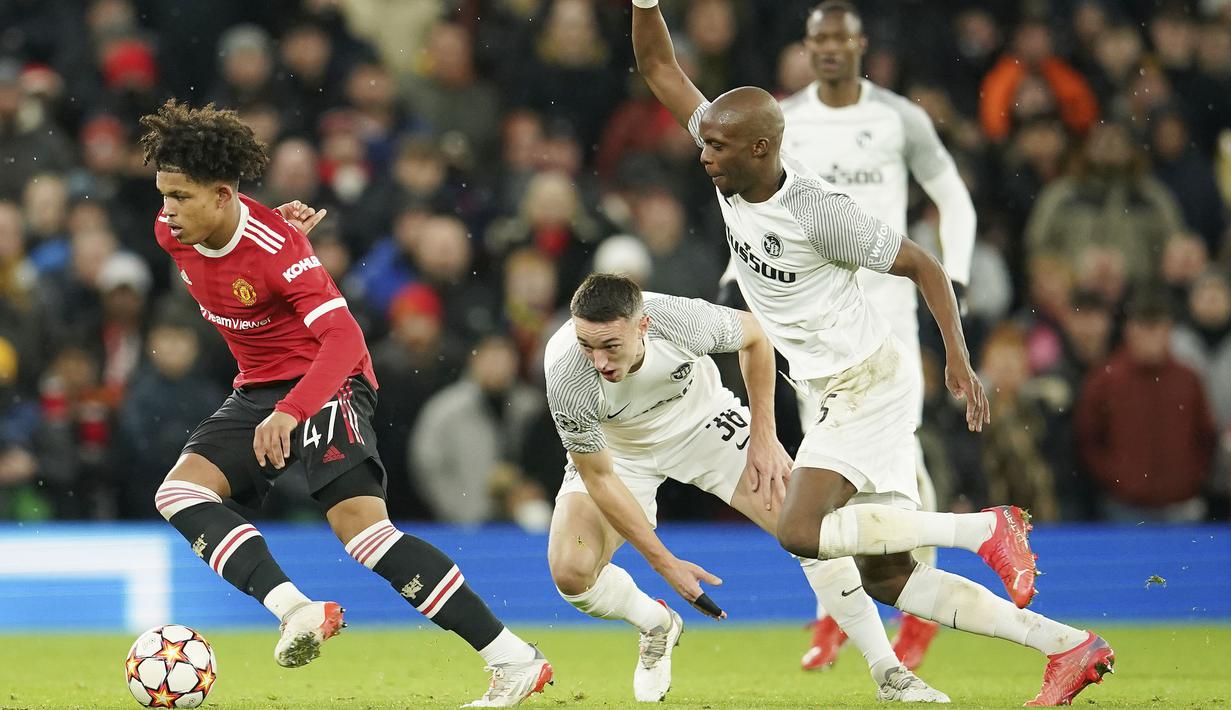 Shola Shoretire - Pemain kelahiran Nigeria ini bukanlah nama yang asing bagi fans Setan Merah. Dia telah menjalani debut pada era Ole Gunnar Solskjaer. Pada duel melawan Young Bouys, Shoretire bermain pada menit ke-68 untuk menggantikan Amad Diallo. (AP/Dave Thompson)