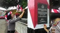 Bripda Mutia, Polwan Polres Bogor yang dianiaya perwira di Polda Jabar kembali ke Polresta Bogor dan tengah menghiasi gapura peringatan 17 Agustus (Liputan6.com/Achmad Sudarno)