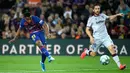 Ansu Fati mencetak dua gol sekaligus saat Barcelona menghadapi Levante dalam laga lanjutan La Liga. Dua gol pemain berusia 17 tahun ini membawa Barcelona menang 2-1 atas Levante. (AFP/Lluis Gene)
