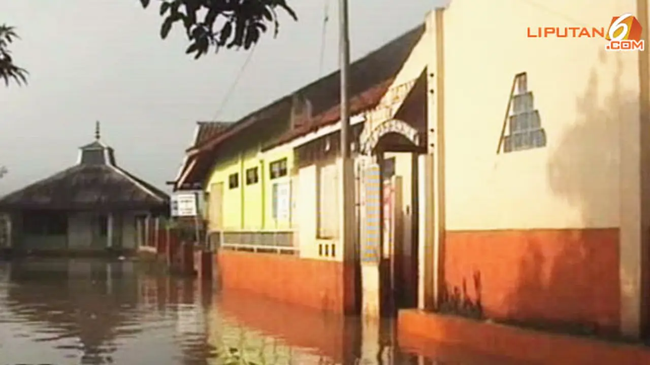 sekolah-banjir130205b.jpg
